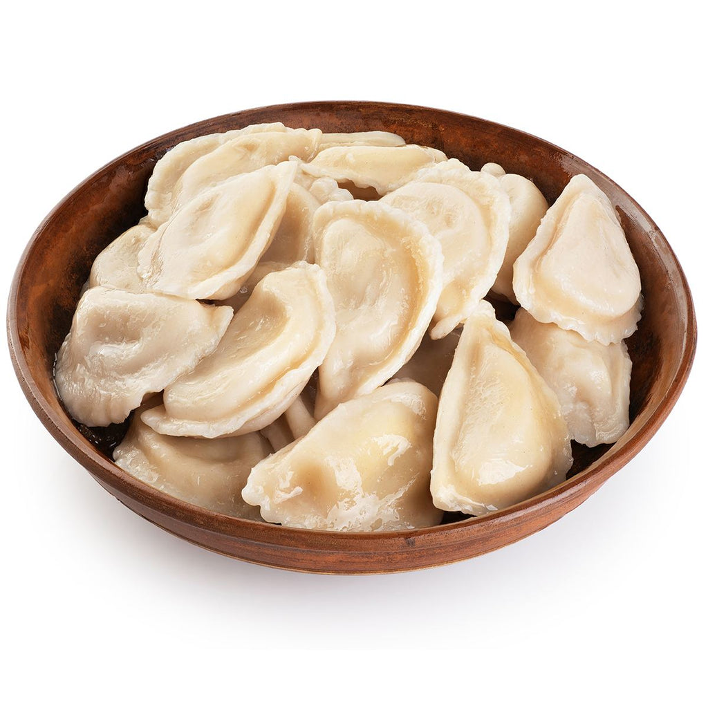 Varenyky mit Sauerkraut und Steinpilze
